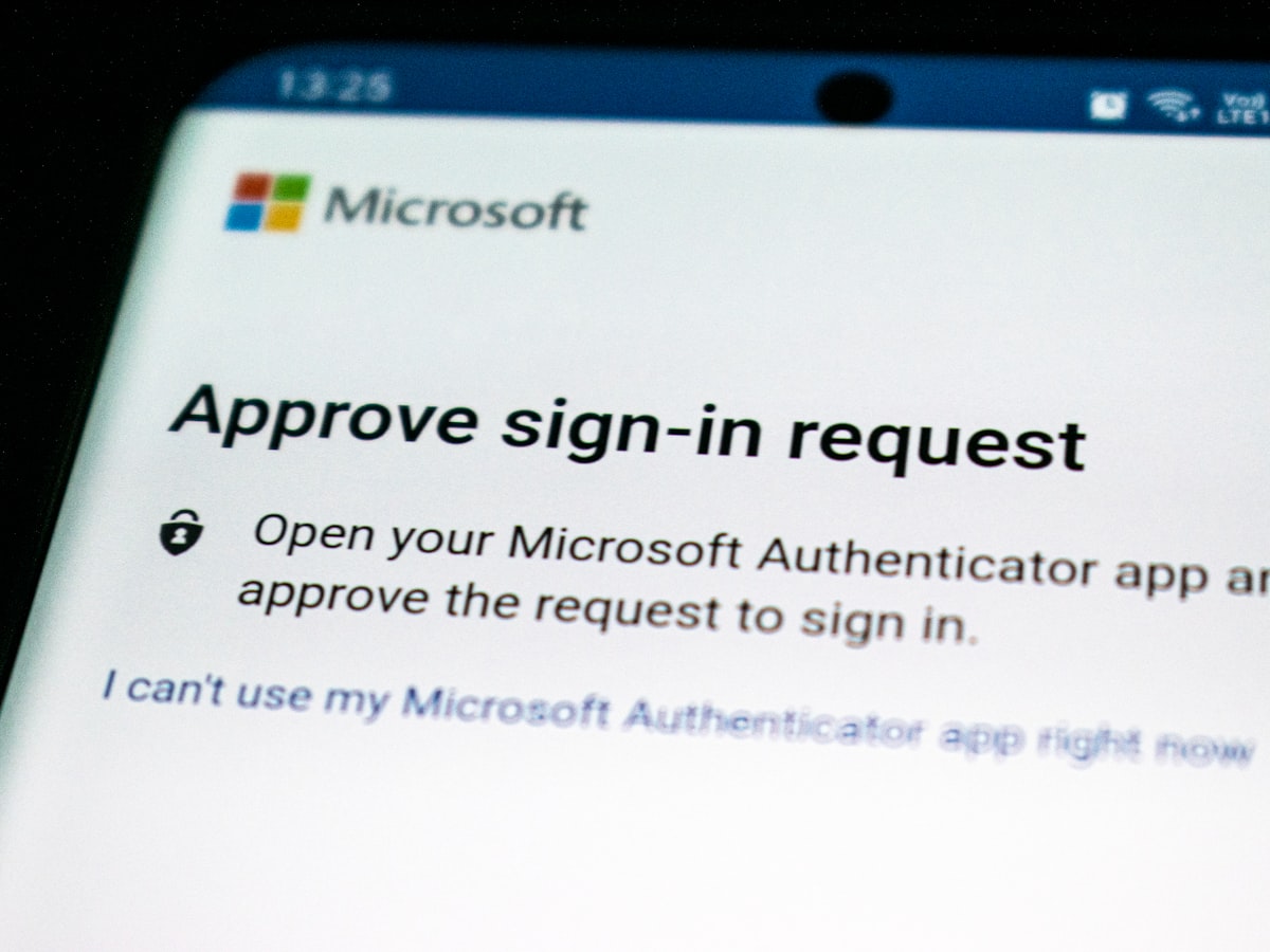 Close-up of a smartphone screen showing an authenticator app's sign-in approval request