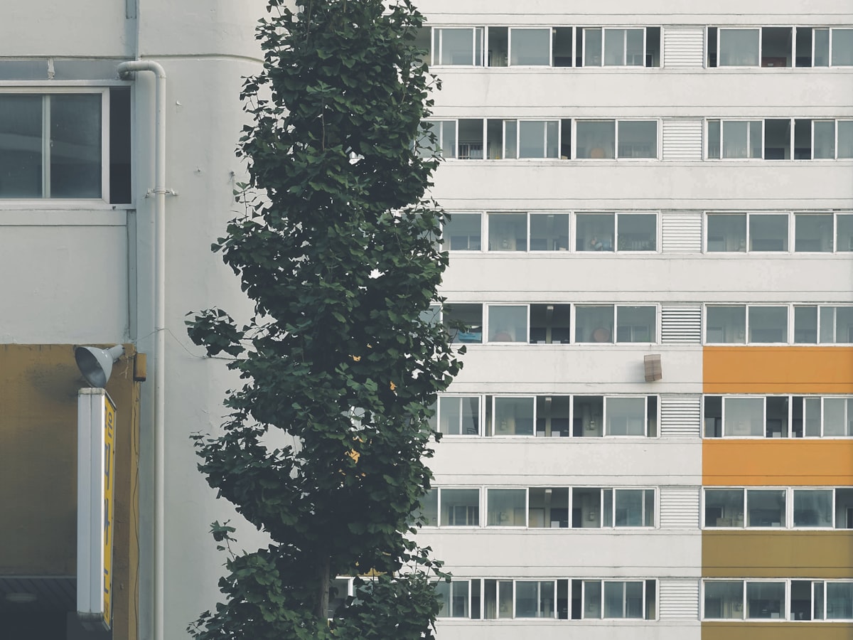 A Korean officetel tower next to a standard apartment complex